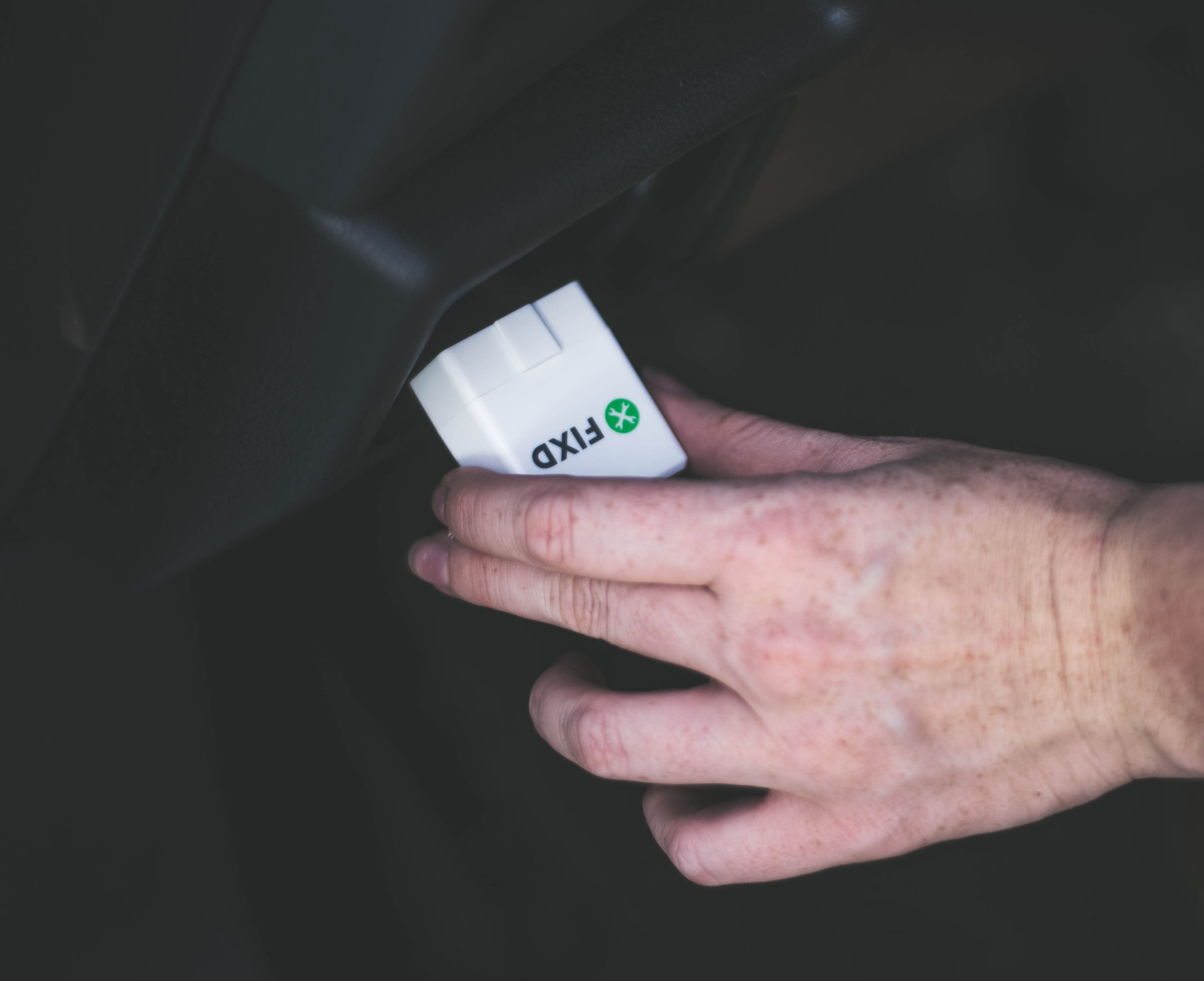 FIXD device plugged into car